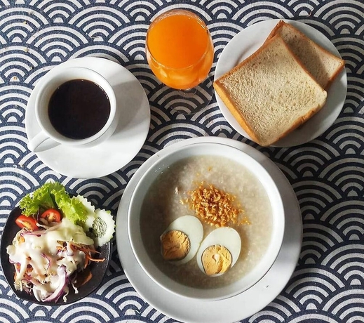 Imagen del bar/restaurante del Hotel Grand Esie Service Apartment. Foto 6