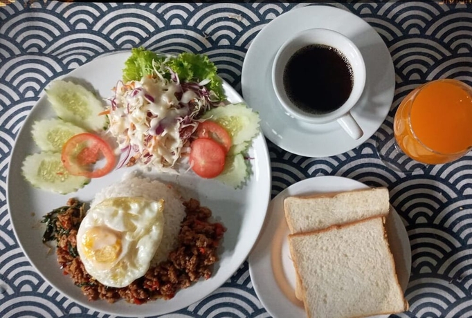 Imagen del bar/restaurante del Hotel Grand Esie Service Apartment. Foto 7