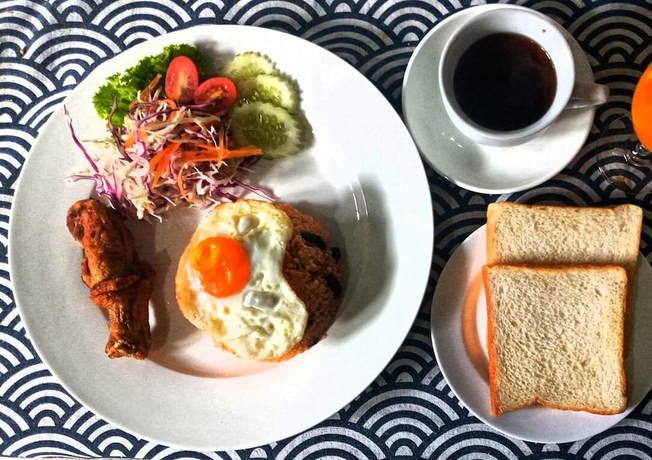 Imagen del bar/restaurante del Hotel Grand Esie Service Apartment. Foto 8