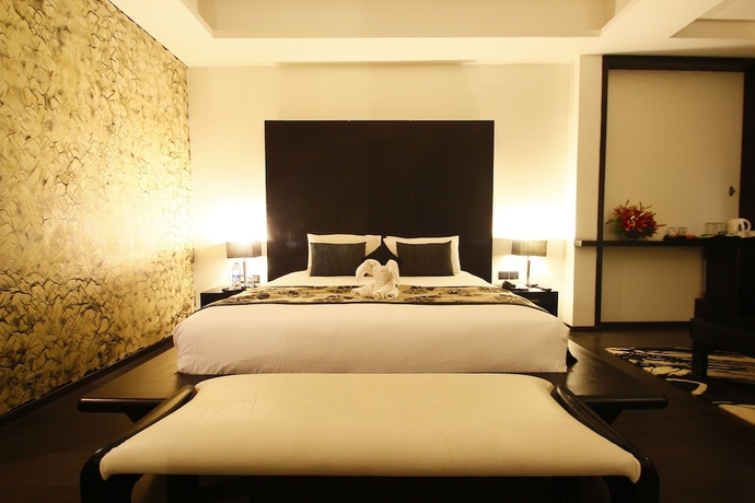 Imagen de la habitación del Hotel Grand Estancia. Foto 16