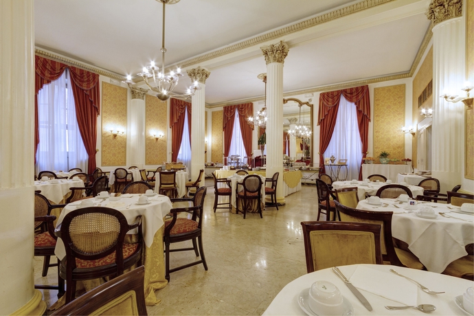 Imagen del bar/restaurante del Hotel Grand Et Des Palmes. Foto 3