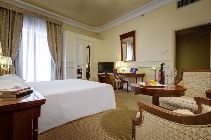 Imagen de la habitación del Hotel Grand Et Des Palmes. Foto 9