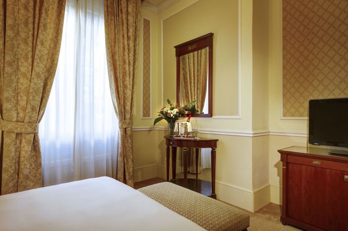 Imagen de la habitación del Hotel Grand Et Des Palmes. Foto 13