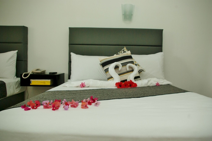 Imagen de la habitación del Hotel Grand Excelsior Port Royal. Foto 5