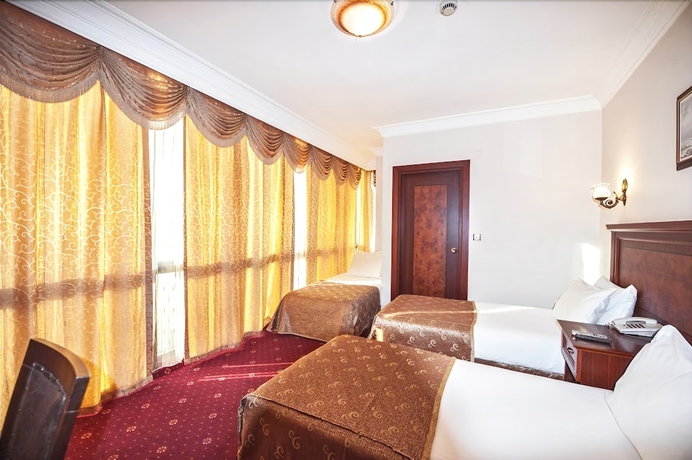 Imagen de la habitación del Hotel Grand Eyuboglu. Foto 2