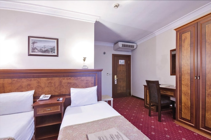 Imagen de la habitación del Hotel Grand Eyuboglu. Foto 8