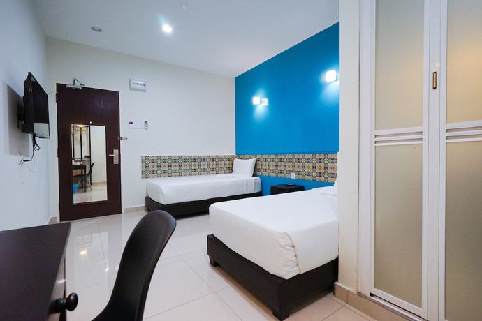 Imagen de la habitación del Hotel Grand FC Hotel. Foto 9