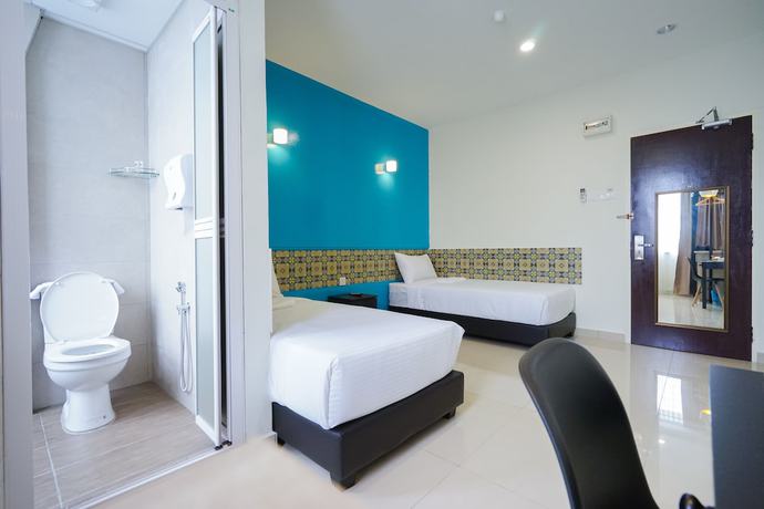 Imagen de la habitación del Hotel Grand FC Hotel. Foto 12
