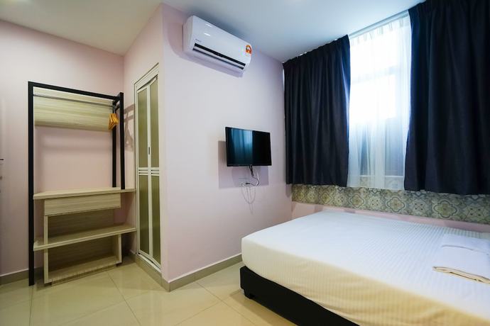 Imagen de la habitación del Hotel Grand FC Hotel. Foto 14