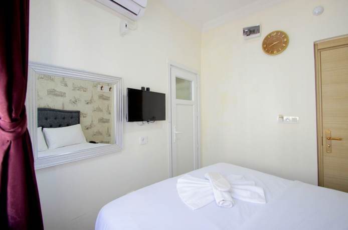 Imagen de la habitación del Hotel Grand FM. Foto 10