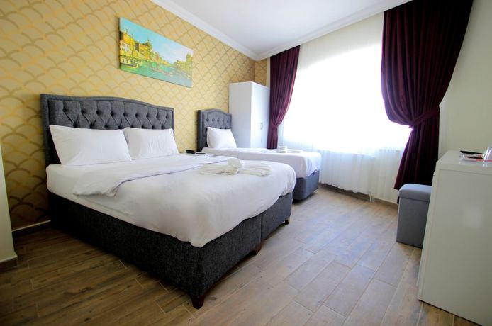 Imagen de la habitación del Hotel Grand FM. Foto 13