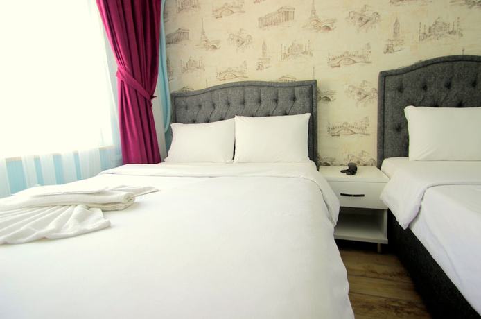 Imagen de la habitación del Hotel Grand FM. Foto 14