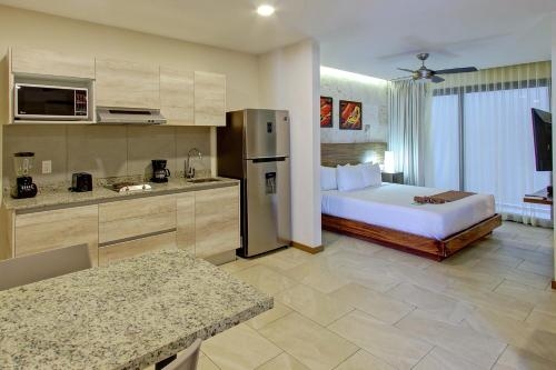 Imagen de la habitación del Hotel Grand Fifty Suites. Foto 6