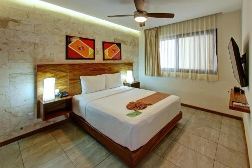 Imagen de la habitación del Hotel Grand Fifty Suites. Foto 7