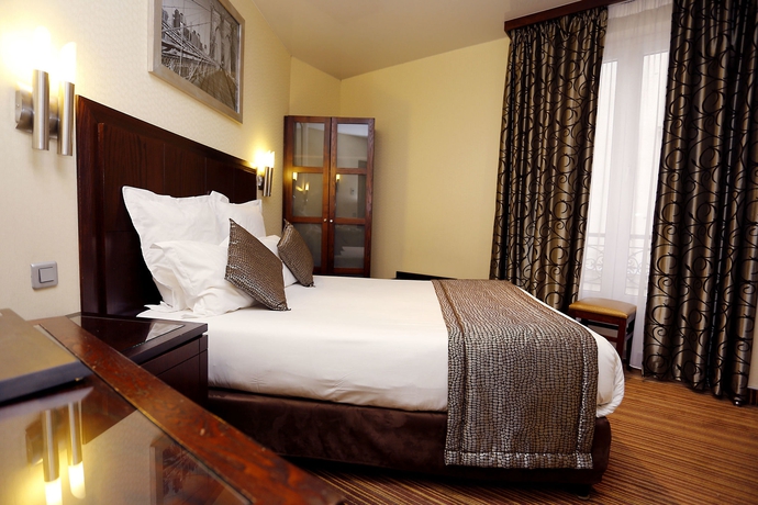 Imagen de la habitación del Hotel Grand Francais. Foto 9