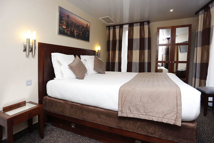 Imagen de la habitación del Hotel Grand Francais. Foto 12