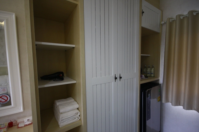 Imagen de la habitación del Hotel Grand Garden Home Resort. Foto 6