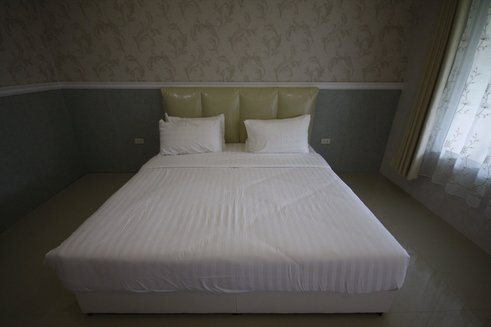 Imagen de la habitación del Hotel Grand Garden Home Resort. Foto 9