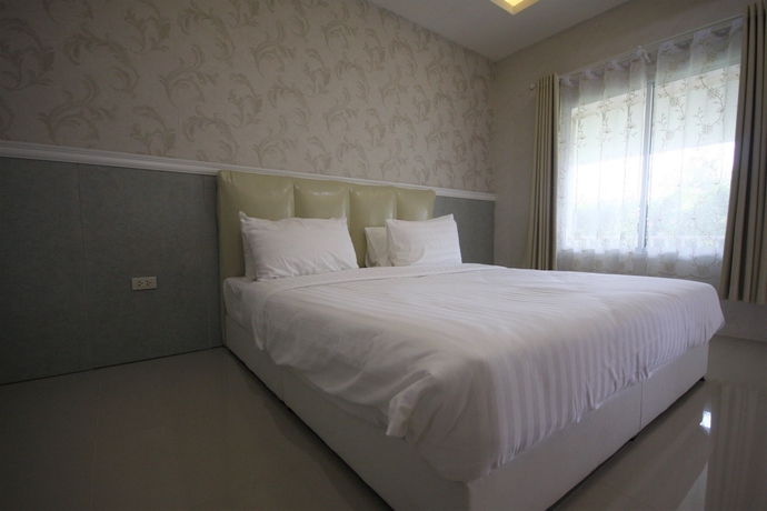 Imagen de la habitación del Hotel Grand Garden Home Resort. Foto 11