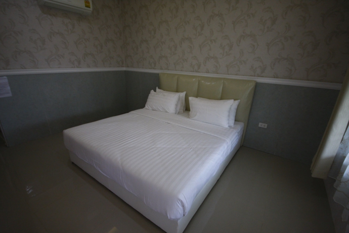 Imagen de la habitación del Hotel Grand Garden Home Resort. Foto 13