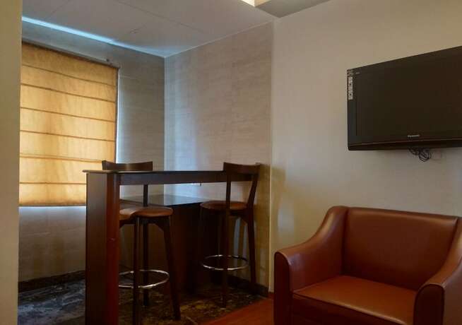 Imagen de la habitación del Hotel Grand Gardenia. Foto 18