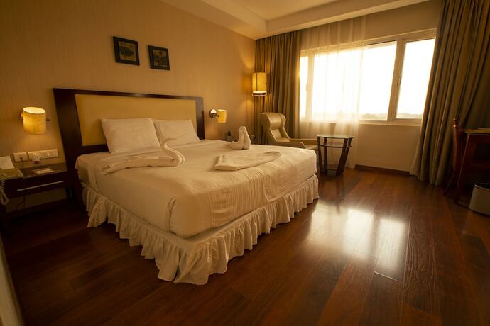 Imagen de la habitación del Hotel Grand Gardenia. Foto 23