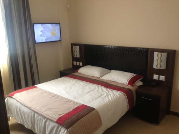 Imagen de la habitación del Hotel Grand Harbour Hotel. Foto 10