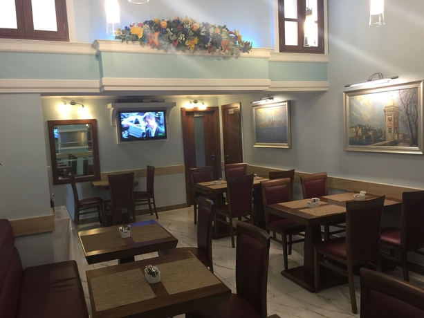 Imagen del bar/restaurante del Hotel Grand Harbour Hotel. Foto 6