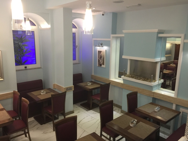 Imagen del bar/restaurante del Hotel Grand Harbour Hotel. Foto 7