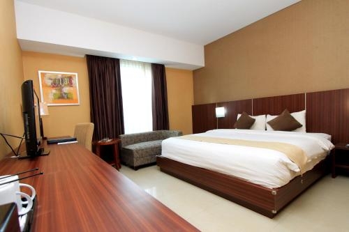 Imagen de la habitación del Hotel Grand Hatika. Foto 7