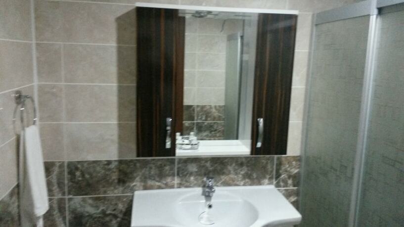 Imagen de la habitación del Hotel Grand Hekimoglu. Foto 14