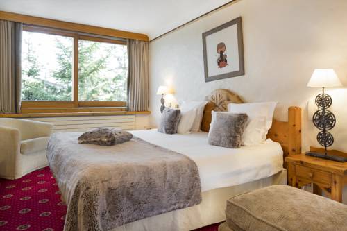 Imagen de la habitación del Hotel Grand H&ocirc;tel Au Rond Point Des Pistes. Foto 9