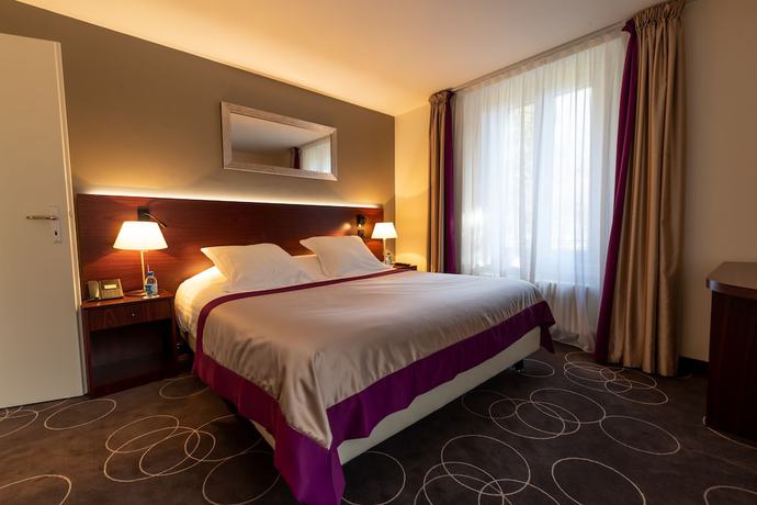 Imagen de la habitación del Hotel Grand H&ocirc;tel des Bains de Lavey. Foto 9