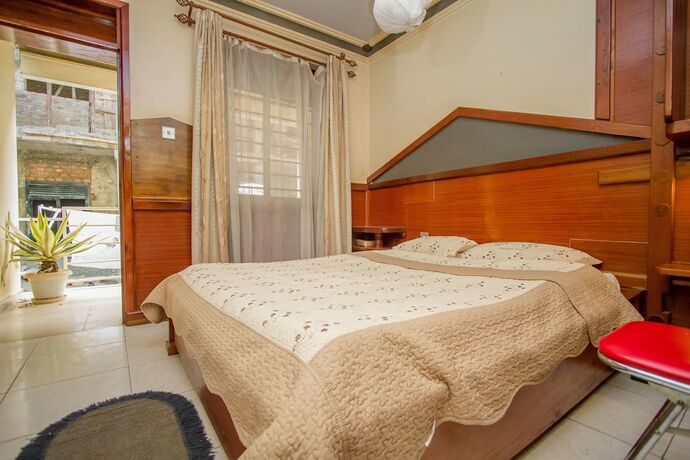 Imagen de la habitación del Hotel Grand Holiday International. Foto 17