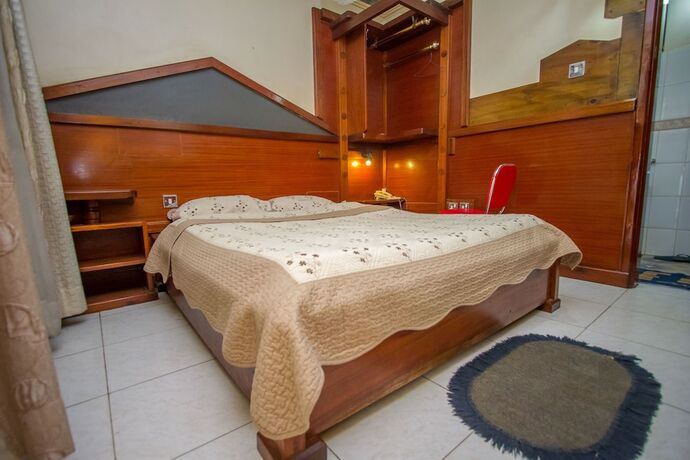 Imagen de la habitación del Hotel Grand Holiday International. Foto 20