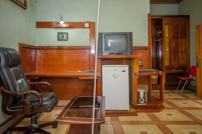 Imagen de la habitación del Hotel Grand Holiday International. Foto 21