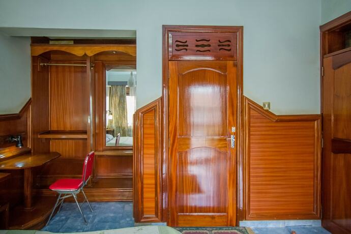 Imagen de la habitación del Hotel Grand Holiday International. Foto 23