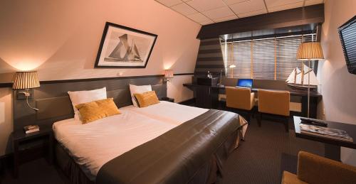 Imagen de la habitación del Hotel Grand Hotel Beatrix. Foto 6