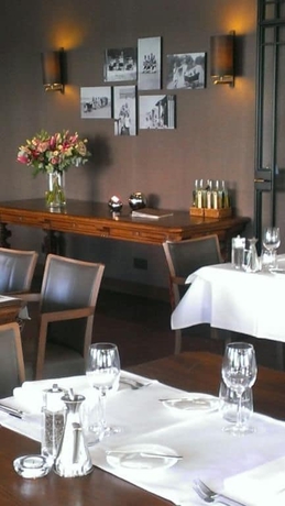 Imagen del bar/restaurante del Hotel Grand Hotel Belle Vue. Foto 4
