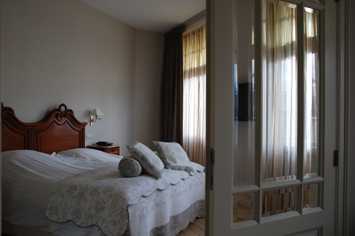 Imagen de la habitación del Hotel Grand Hotel Belle Vue. Foto 10