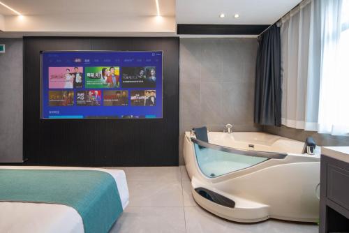 Imagen de la habitación del Hotel Grand Hotel - Changsha Xiangjiang Century City Kaifu District Government Subway Station. Foto 18