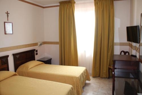 Imagen de la habitación del Hotel Grand Hotel Degli Angeli. Foto 9