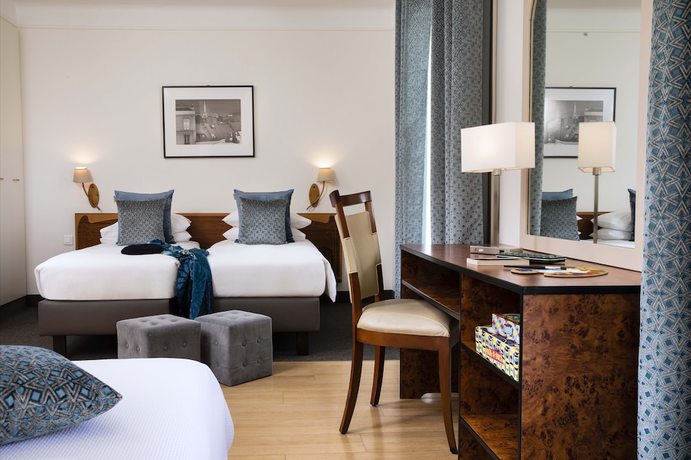 Imagen de la habitación del Hotel Grand Hotel Des Balcons. Foto 12