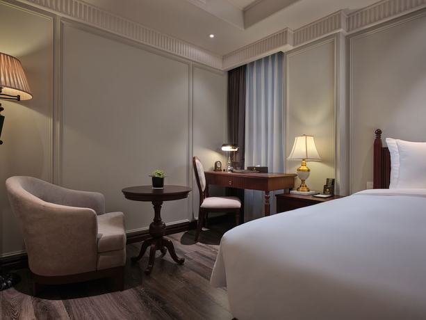 Imagen de la habitación del Hotel Grand Hotel Du Lac Hanoi. Foto 11