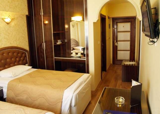 Imagen de la habitación del Hotel Grand Hotel Duman. Foto 2