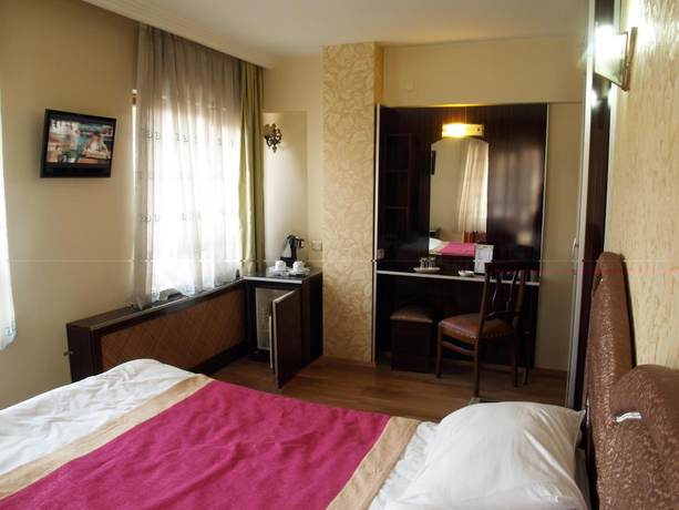 Imagen de la habitación del Hotel Grand Hotel Duman. Foto 5