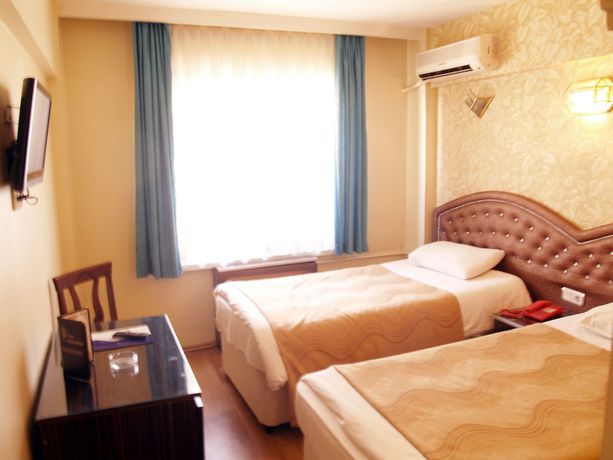 Imagen de la habitación del Hotel Grand Hotel Duman. Foto 8