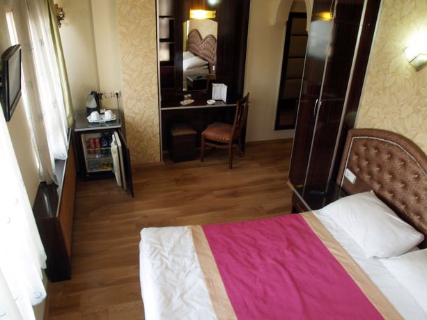 Imagen de la habitación del Hotel Grand Hotel Duman. Foto 10