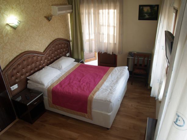 Imagen de la habitación del Hotel Grand Hotel Duman. Foto 13