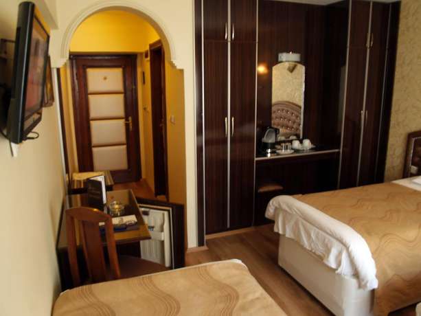 Imagen de la habitación del Hotel Grand Hotel Duman. Foto 15
